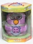 Furby-fake-marzianetto-2.jpg (148 KB) A purple Marzianetto with brown eyes in its box.