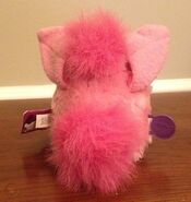 The tail of a Pink Flamingo Furby
