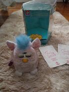 Portuguese Baby Pink Furby Baby out of its box with its instructions