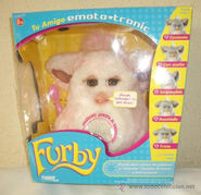 A Spanish Strawberry Swirl Furby in its box