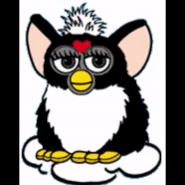 The "prototype" Furby gif on a cloud seen on the dictionary.