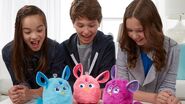 Blue, pink, and magenta Furby Connects next to each other