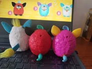 Back view of three of the McFurbys