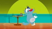 In remake, Oggy is calling with cordless phone.