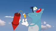 In revised version Oggy inflamed rocket with match.