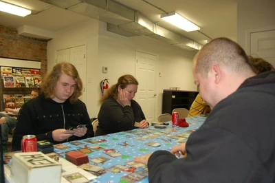 Ogres and friends playing Magic: The Gathering