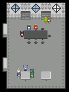 A study room of sorts. A group of villagers can be seen having a meeting in the white table
