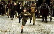 Oliver being chased in the streets of London
