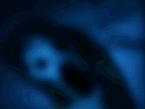 A blurry closeup of HellMari near the ceiling.