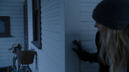 Bike with front basket on Zelena's porch