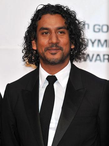 Naveen Andrews enjoys lunch with his friend and their children at