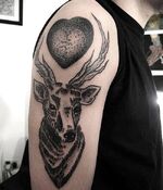 A moose and a heart on right arm May 3, 2013