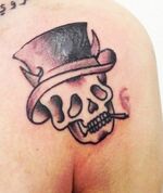 Zayn-malik-skull-top-hat-tattoo-400x474