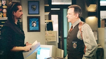 Agent John McBain and Commissioner Bo Buchanan