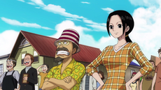 Makino y Woop Slap observando a Luffy partir