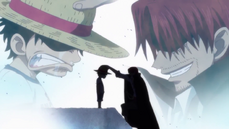 Shanks donne le Chapeau de Paille à Luffy