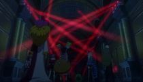 Team B tries to avoid security beams.