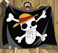 Luffy dibuja el jolly roger de los Piratas de Sombrero de Paja