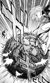 Tatsumaki encases Apollo in a spherical mass of debris.