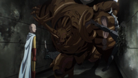 Carnage Kabuto punches Genos into the wall