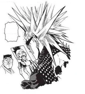 Zakos admiring a picture of his girlfriend