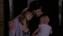 Lydia with her parents on Jamie's Bed