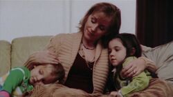 Lydia with her two young daughters  and Haley. ("").