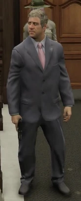 President Callow in his suit with his gun drawn
