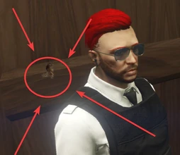 Robbie Turnborough next to a bullet hole from the hail of gunfire that killed Gary