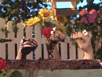 Oobi and Kako covered in mud