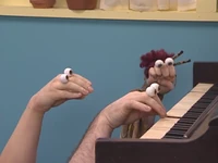 Oobi-Piano-Lesson-Grampu-playing.png (382 KB) Grampu plays the tune for Oobi...