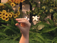 Oobi-Garden-Day-Uma-with-a-flower