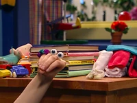 Uma with a dust bunny