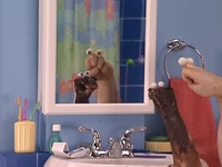 Uma looking in the mirror