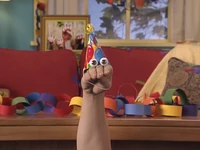 Oobi wearing his hat
