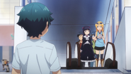 The group walking towards Izumi Masamune in the eleventh episode of Eromanga-Sensei