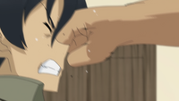 Kyousuke getting punched by Daisuke in the livingroom - S01E03 - m23 s26