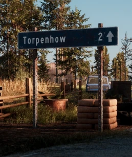 Sign noting the distance to Torpenhow