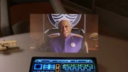 Admiral Tucker addresses the Orville Captain's Office.