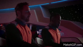 USS Orville firing it's plasma cannons at a Krill ship.