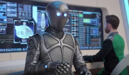 , likely the Chief Science Officer of the , at his station on the .