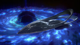 The Orville drifts alongside the wormhole, a gateway to the 29th century.