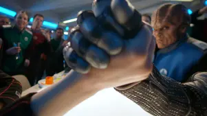 A zipper can be seen on Isaac's "machine" wrist.