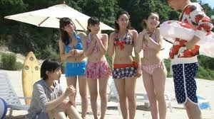 Haruhi and her admirers at the beach.