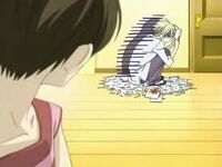 Haruhi watches as Tamaki creates a hamster nest in a bout of depression.