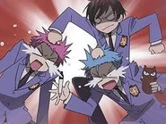 Hikaru is punched by Haruhi before the twins reveal their 'fight' was fake