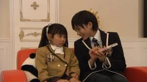 Haruhi reads to Kirimi - shojo manga, of course!