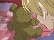 Honey wakes up to find Kuma-bear, not Usa-chan, beside him.