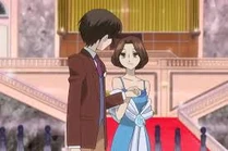 Leading "his" lady onto the dance floor.