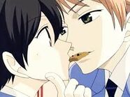 Hikaru takes a bite of Haruhi's cookie in a most... intimate... manner.